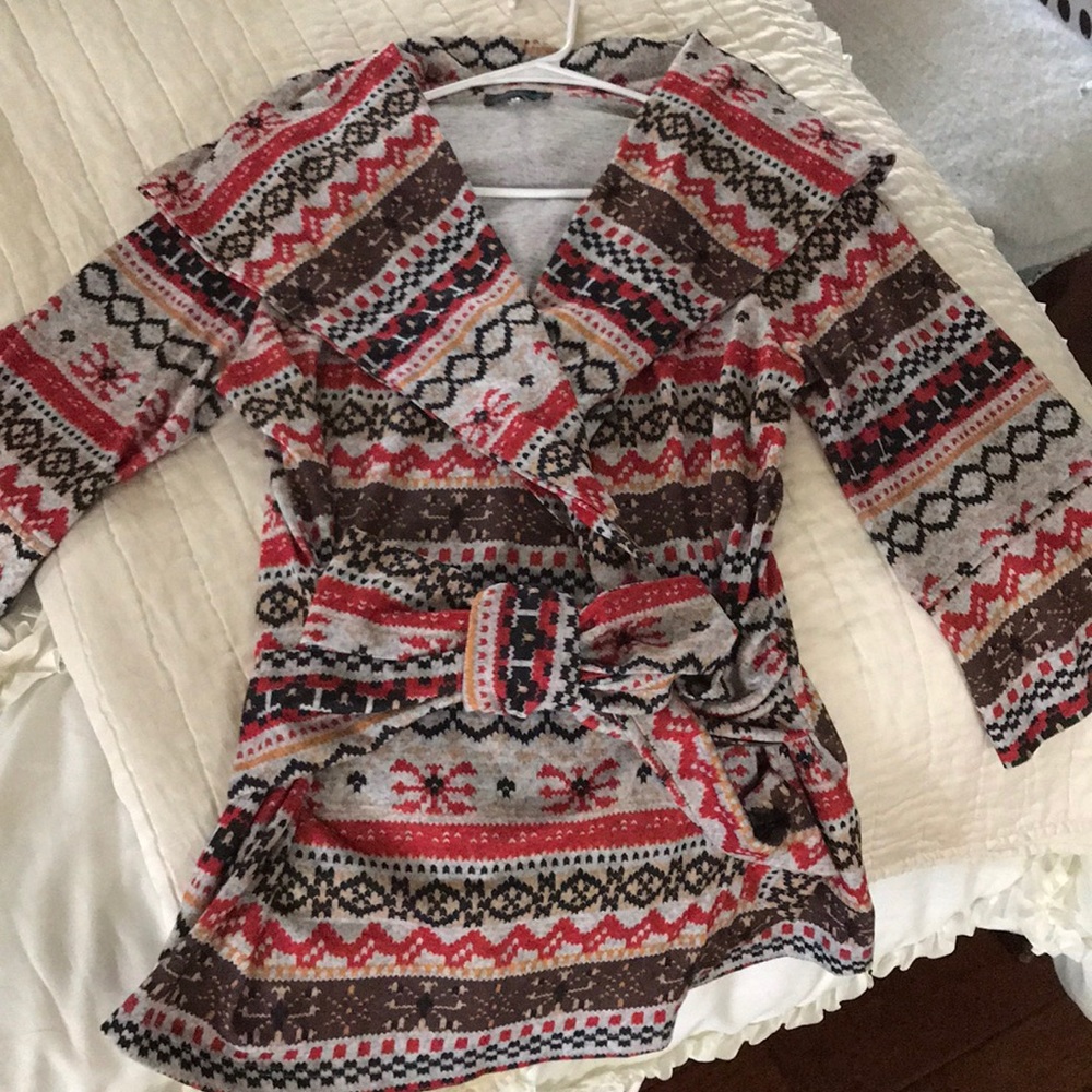 Cute wrap style cardigan. Very pretty colors